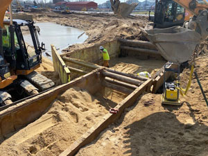 Steel Trench Box in Steel trench boxes and Slide Rail panels being used for a remediation dig.